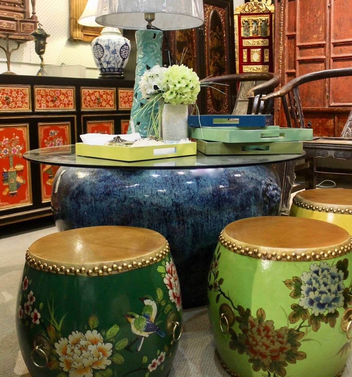 Ceramic pot, wooden drums, lamp, trays