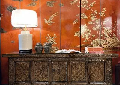 chinese vintage carved sideboard from xinjiang, with red & gold screen background