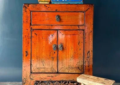 Distressed glossy orange Chinese small cabinet