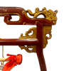 Chinese wooden stand with brass gong close up