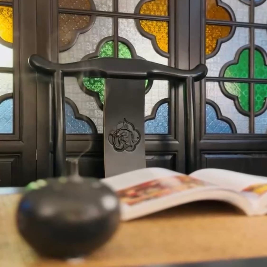 a look at the carving on the back of the chinese chair