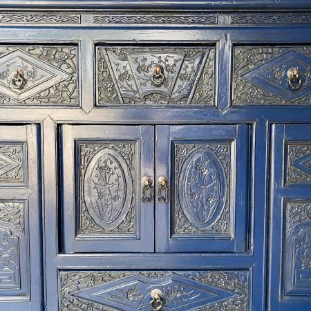 Close up of blue Chinese carved sideboard