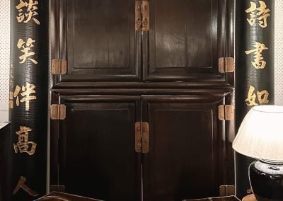 Chinese antique dark original 2-tier Shandong cabinet with original brass hardware