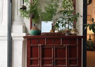 Chinese antique carved mirror frame and red Shanxi small cabinet