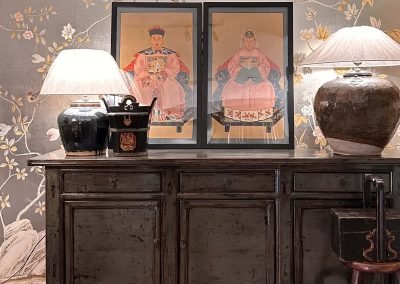 Chinese antique furniture, distressed green grey Shanxi sideboard against a chinoiserie hand-painted wallpaper