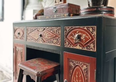 Black & red carved antique Chinese Fujian dressing table close up side view