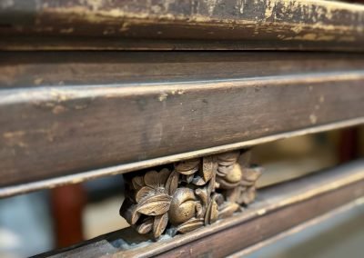 Close up of carving on bench