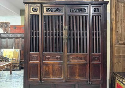 Chinese antique large cabinet with spindle doors and sides