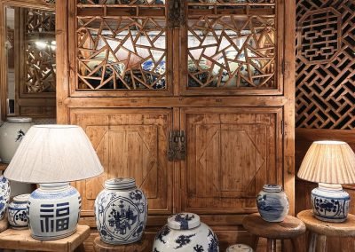 Chinese antique cabinet with cracked ice lattice doors and blye and white ginger jars