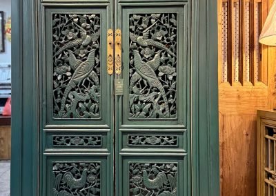 Tapered cabinet with beautiful old carvings as doors - sea green finish