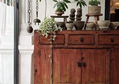 Chinese vintage cabinet from Shandong repainted in a glossy distressed pink