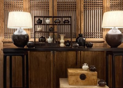 Chinese antique Ming-style long table with antique Shanxi dpprs, cream leather boxes
