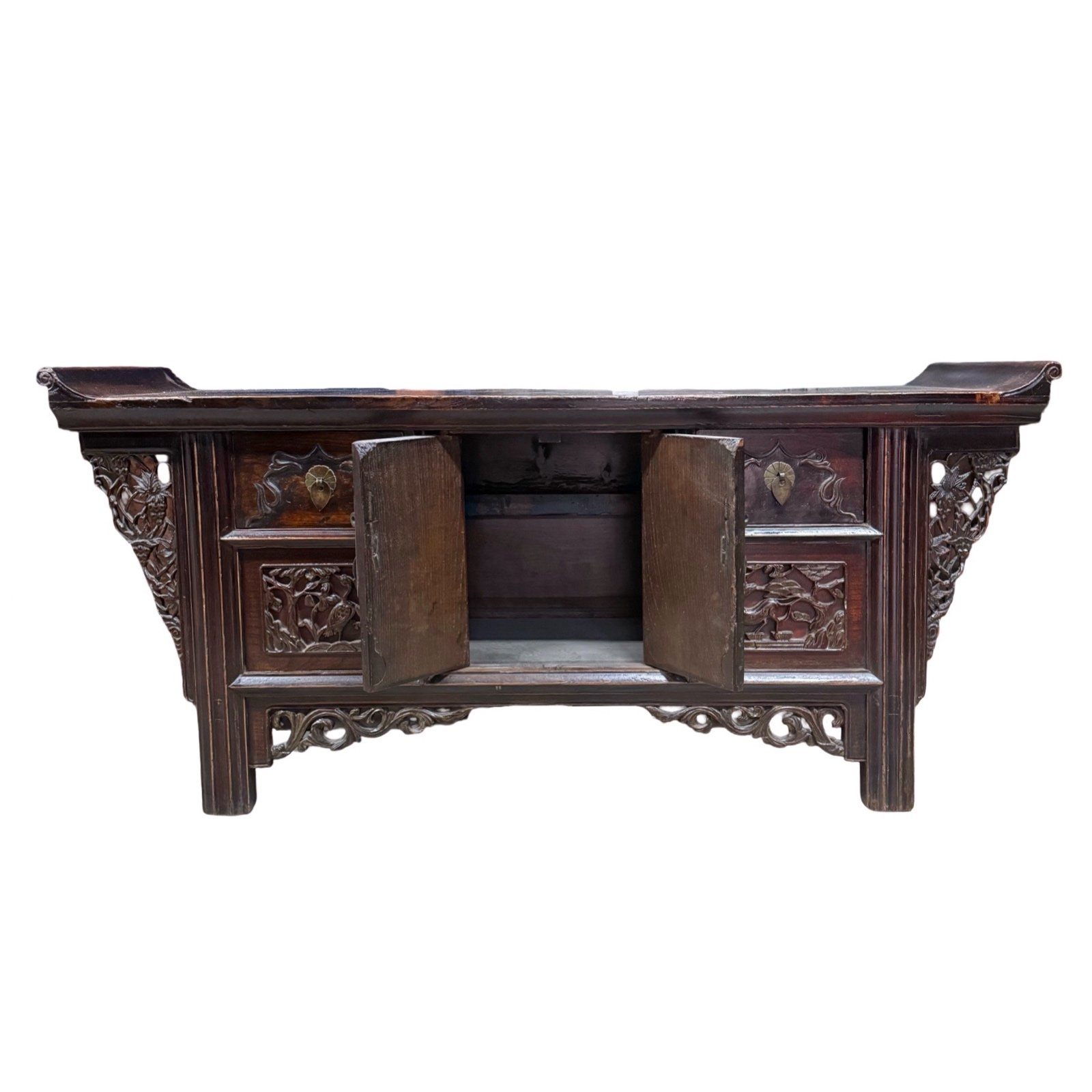 inside of Antique Chinese low small sideboard with everted flanges and carved crane and deer panels