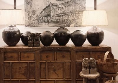 Chinese antique long sideboard with iron details, Tung Yue Nang painting of Smith Street, vintage ceramic pots & lamps